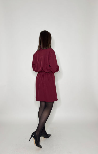 Abito Gioiello con bracciali in oro ai polsi Bordeaux